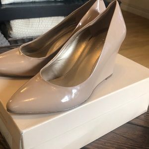 BCBG Generation patent leather nude wedge pump